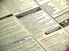 Scanning the job section of the local paper