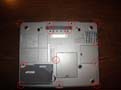 Dell D600 underside showing screw holes