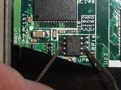 Shorting out the pins with a paperclip