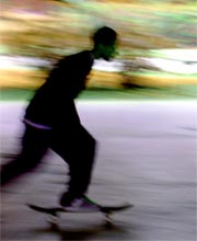 A young man on a skateboard